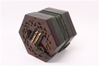 Lot 1523 - 19th century rosewood concertina of hexagonal...