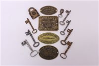 Lot 1548 - Collection of four brass safe plates, together...