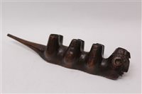 Lot 1638 - Unusual smoking pipe with seven bowls Carsved...