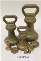 Lot 1533 - Set of fifteen brass metric weights - 2...