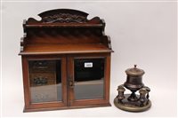 Lot 1659 - Early 20th century walnut smokers cabinet...