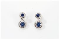 Lot 1299 - Pair white gold (18ct) and blue sapphire...