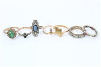 Lot 1261 - Group of seven gold and yellow metal dress rings