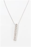 Lot 1263 - White gold (9ct) diamond set pendant on white...