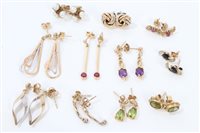 Lot 3217 - Eleven pairs of gold and yellow metal gem set...