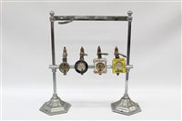 Lot 3737 - Vintage four-bottle bar stand with optics in...