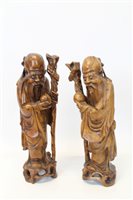 Lot 3559 - Pair Oriental carved hardwood figures of Shou...