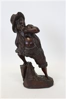 Lot 3589 - Carved Black Forest figure of a man smoking a...