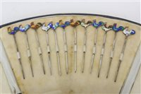 Lot 3572 - Set of twelve silver cocktail sticks (stamped...