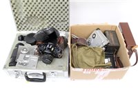 Lot 3634 - Canon A1 SLR Camerasera with various lenses...