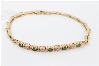 Lot 3272 - Gold (14k) emerald and diamond bracelet, 18cm