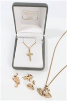 Lot 3253 - Gold (9ct) cross pendant on gold (9ct) chain,...