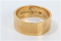 Lot 3262 - 1930s gold (18ct) thick band wedding ring...