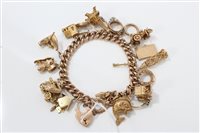 Lot 3265 - Gold (9ct) charm bracelet with quantity of...