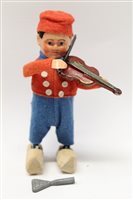 Lot 2814 - German tinplate clockwork figure of Dutch boy...