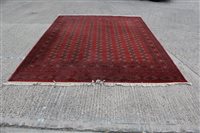 Lot 1509 - Pakistan Tekke-style rug with nine rows of...