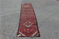 Lot 1516 - Hamadan runner with three medallions and...