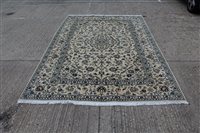 Lot 1519 - Kashan carpet with scrolling foliate ornament...