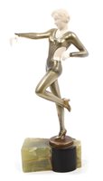 Lot 870 - Art Deco cold-painted and ivory mounted figure...