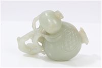 Lot 873 - Carved Chinese jade pomegranate, pale celadon...