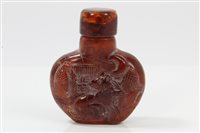 Lot 955 - Chinese carved amber snuff bottle and stopper,...