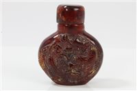 Lot 956 - Chinese carved amber snuff bottle and stopper...