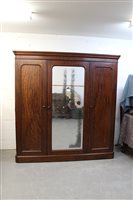 Lot 1337 - Victorian mahogany triple wardrobe with...
