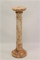 Lot 1339 - Carved pink variagated marble column with...
