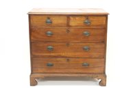 Lot 1368 - George III oak chest of drawers, having two...