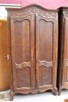 Lot 1381 - 19th century French carved chestnut armoire...