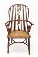 Lot 1382 - Early 19th century yew and elm Windsor chair,...