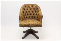 Lot 1420 - Leather button-upholstered desk swivel chair,...