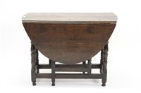 Lot 1424 - Early 18th century oak drop-leaf table,...