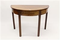 Lot 1458 - George III mahogany D-shaped table, raised on...