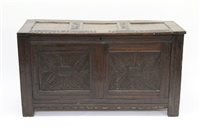 Lot 1312 - 17th century carved oak coffer with triple...
