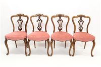 Lot 1470 - Set of four Victorian carved walnut salon...