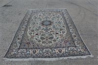Lot 1501 - Large Tabriz rug - cream ground with arabesque...