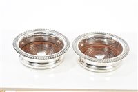 Lot 201 - Pair early Victorian silver wine coasters of...