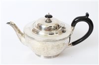 Lot 230 - 1930s silver teapot of cauldron form, with...