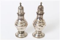 Lot 255 - Pair Edwardian silver pepperettes of baluster...