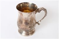 Lot 258 - Large 19th century white metal mug of baluster...