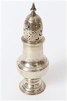 Lot 281 - George II silver caster of shaped baluster...