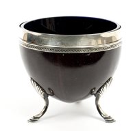 Lot 283 - George III silver mounted coconut cup with...