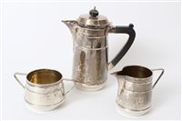 Lot 322 - 1930s silver three piece coffee set in the Art...