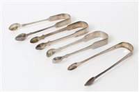 Lot 343 - Four pairs Georgian silver sugar tongs...