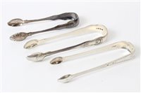 Lot 344 - Three pairs Georgian silver sugar tongs -...