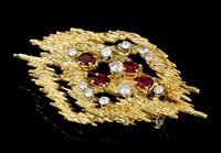 Lot 460 - 1970s 18ct gold diamond and ruby pendant...