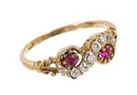 Lot 462 - Late Victorian ruby and diamond crossover ring...