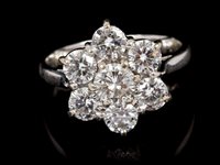 Lot 470 - Diamond cluster ring, the flower-head cluster...