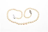 Lot 480 - Cultured pearl necklace with a string of...